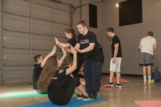 Pairs of people exercising together