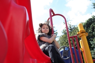 A girl on a play structure