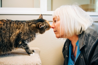 Photo of a woman with her cat