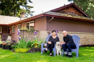 Photo of a couple with their dog