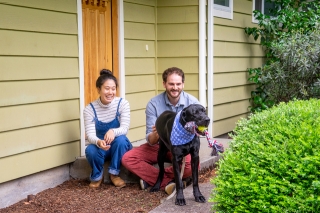 Photo of a couple with their dog