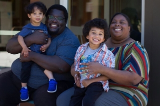 A mother and father with their two boys