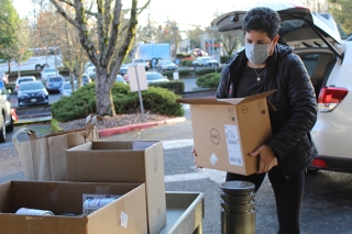 A woman packing supplies