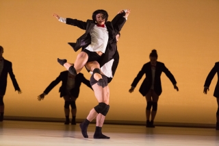 Photo of a NW Dance Project dancer leaping