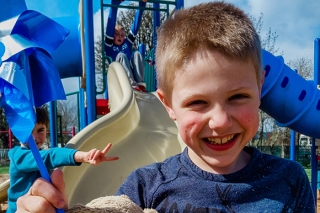 Photo of a boy on a slide